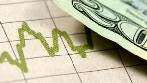 Gráfico financiero con billete, economía en crecimiento