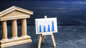 Modelo de banco con gráfico de barras, concepto económico